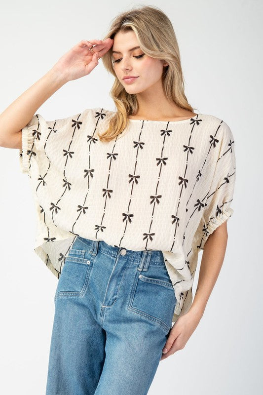 Cream Bow Print Top